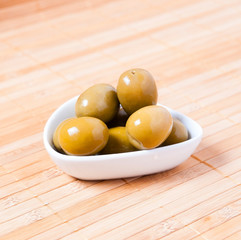 olives in a white bowl