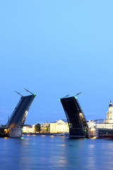 Fototapeta na wymiar Drawbridge in St. Petersburg at white night