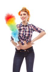 Sexy housewife holding a duster