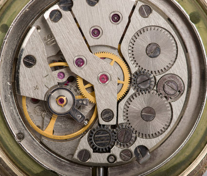 The mechanism of an old watch close-up