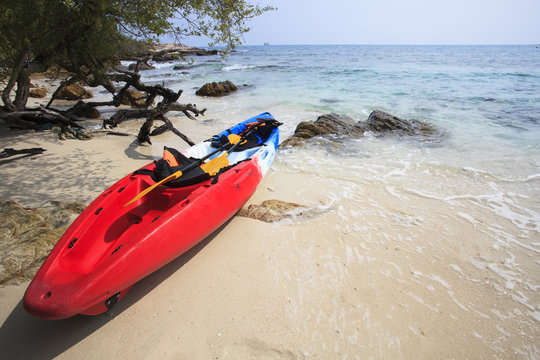sea kayak canoe on sea sand beach with beautiful nature coast be