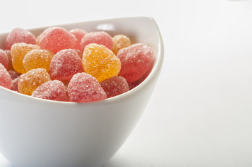 Delicious colorful jelly candy on a white background