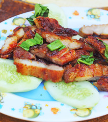 Grilled Pork and cucumber dish.