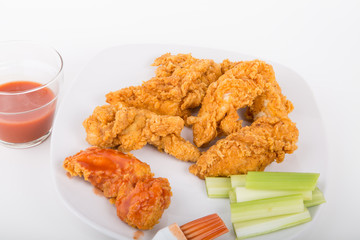 Chicken Fingers with Hot Sauce and Celery