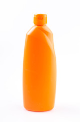 Orange cleaning bottle on isolated white background