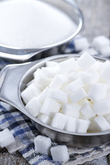 Portion of white sugar