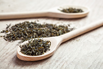 Dried green tea leaves