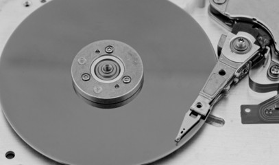 Open computer hard drive on white background