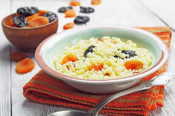 Millet porridge with dried fruit