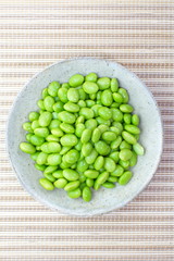 edamame nibbles, boiled green soy beans, japanese food