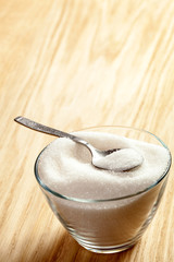 Spoon in a bowl of sugar
