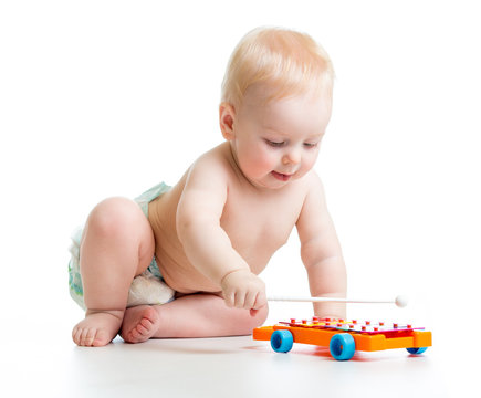 baby playing  with musical toys