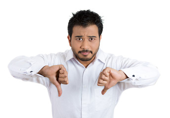 Unhappy business man giving thumbs down
