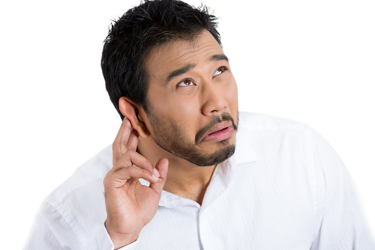 Annoyed man, student, worker having hearing problems