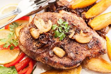 Fried pork chop with mushrooms