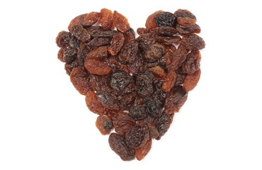 Heart of raisins isolated on white background