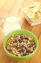 Delicious and healthy cereal in bowl with milk