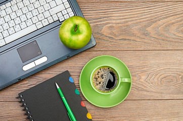 green apple on worplace