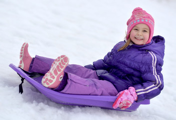 Sledding, winter fun, snow, baby sledding at winter time