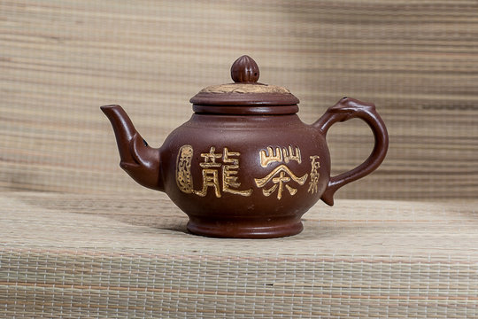Chinese clay teapot with hieroglyphic