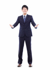 Young Asian business man showing welcom sign.