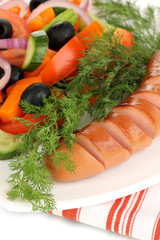 Grilled sausage with fresh salad close up