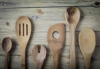 Assorted old wooden kitchen utensils