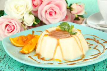 Panna Cotta with orange zest and caramel sauce,