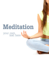 Young beautiful fitness girl doing yoga exercise isolated