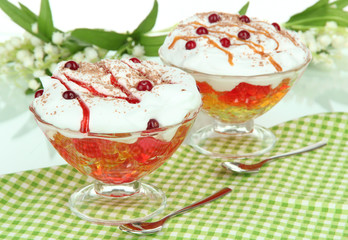 Tasty jelly on table on white background