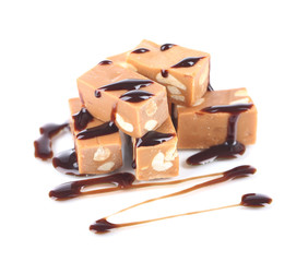Many toffee with chocolate isolated on white