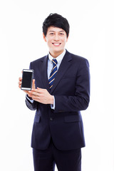Fototapeta na wymiar Asian business man with cellphone.