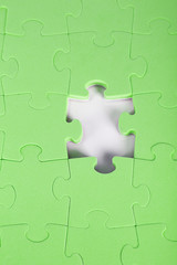 Obraz premium Last piece of jigsaw puzzle, close-up