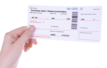 Airline tickets in hand isolated on white