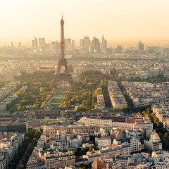 Paris skyline at sunset, France. Aerial view of Eiffel Tower in summer. 