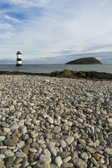 Penmon Beach, Anglesey, Wales. Lighthouse and Puffin Island.