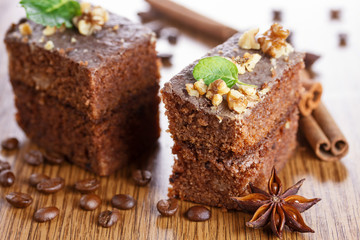 Slice of chocolate cake with nuts
