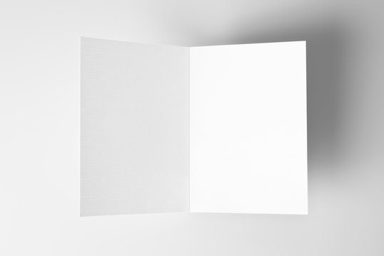 Blank open card over grey background