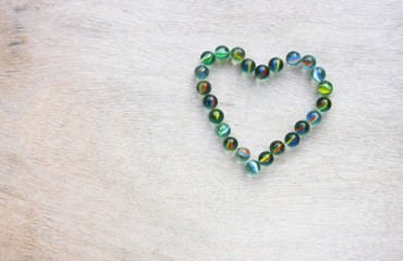 heart shape made from marbles with vintage effect. 