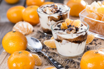 Portion of Yogurt with Tangerines and Chocolate