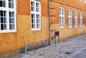 Traditional window on yellow background wall