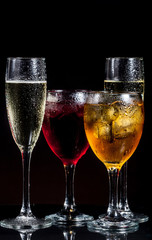 Several glasses of different drinks 
