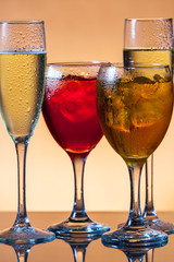 Several glasses of different drinks 
