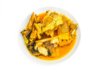 popular delicious spicy thai food curry fish head in bowl isolat