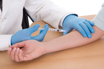 Obraz premium close up of doctor giving an injection to woman