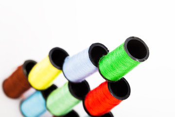 Pyramid of colourful cotton reels