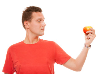 Happy man holding apple. Diet health care healthy nutrition.