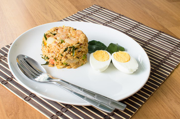 Khow Pat Tom Yum Koong  - Stir fried spicy rice with herbs and p