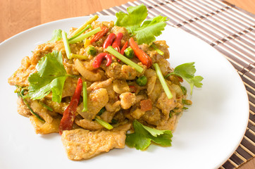 Stir fried pork spicy yellow curry with vegetable