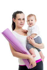 Mother going to do fitness exercises with her baby